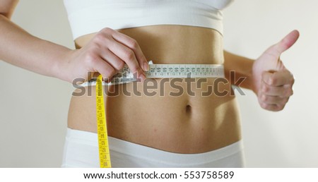 diet, lose weight, thin woman Royalty-Free Stock Photo #553758589