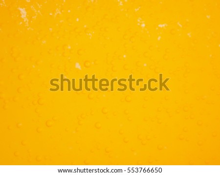Abstract blurry orange bubbles of effervescent water