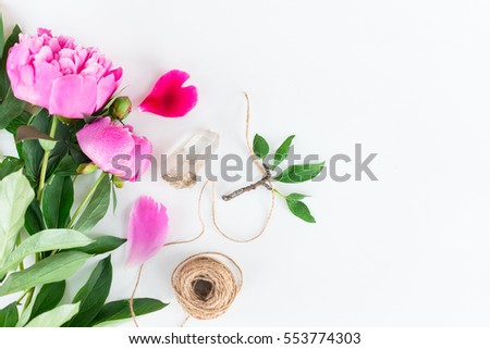 Cute vintage photography with flowers, petals an leaves Flat lay top view. Minimalistic photo for blogs, websites, social media platforms.