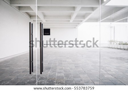 Glass door with welcome wording in the building