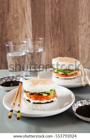 sushi plate with burger made from rice and smoked salmon, avocado, light cheese and nori