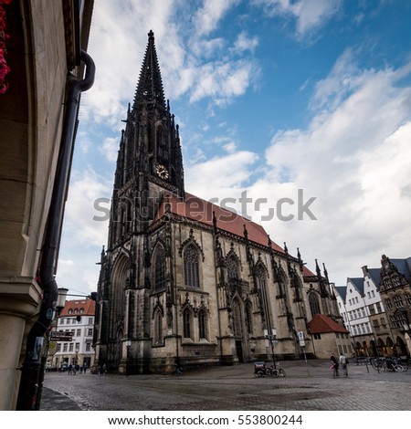 Lambertikirche (St. Lamberti's Church), Munster, Germany. Low angle view of the Lambertikirche in the side streets of the old centre of Munster in Westphalia, North-West Germany.