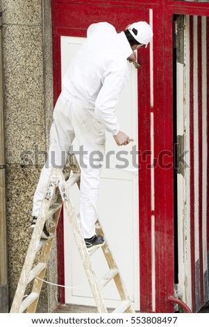 painter man professional working at risk to drop , concept  danger at work