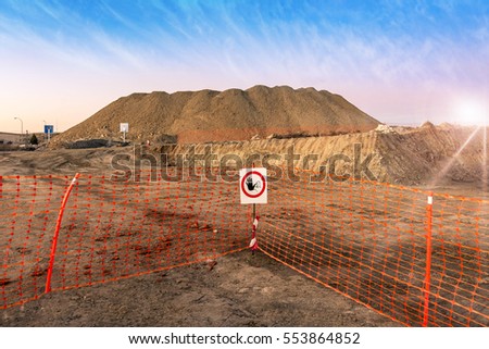 
Photograph of a construction site of a road with a sign prohibiting the passage
