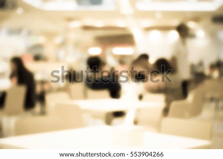 Blurred  background abstract and can be illustration to article of People Tables and chairs in restaurant