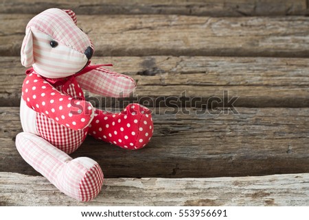 bear doll on wood background concept valentine