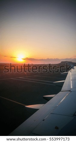 Sunrise from airplane window, soft Focus.