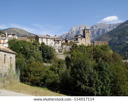 Pyrenees, Spain: Mountain landscape of nature and buildings

