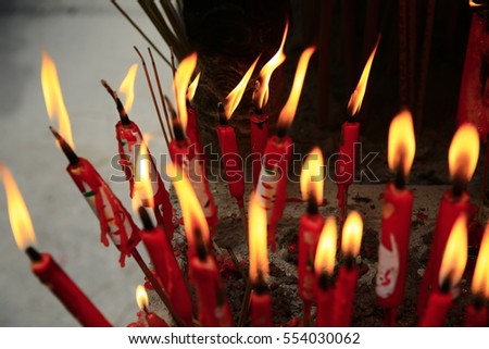 Blur Red candle in temple Chinese new year