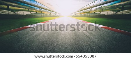 View of the infinity empty asphalt international race track, digital imaging retouch and  montage background . evening scene . Royalty-Free Stock Photo #554053087