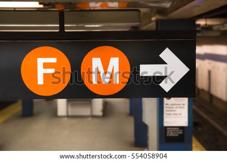New York City subway sign for the F and M trains