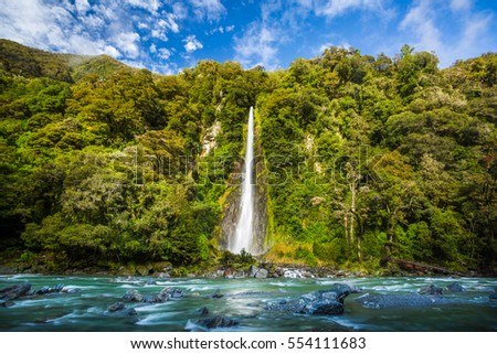 Thunder Creek Falls in Haast Pass New Zealand Royalty-Free Stock Photo #554111683