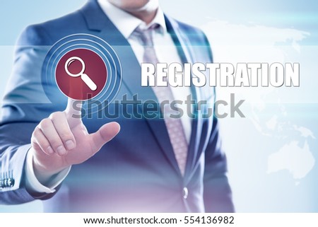Business, technology, internet concept on hexagons and transparent honeycomb background. Businessman  pressing button on touch screen interface and select  registration