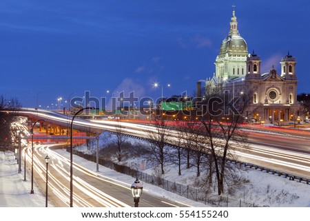 Basilica of St Mary and Rush Hour Highway Traffic during Twilight in Minneapolis