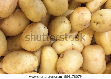 Potatoes at a market Royalty-Free Stock Photo #554178079