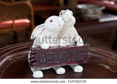 Welcome with two lovely rabbits