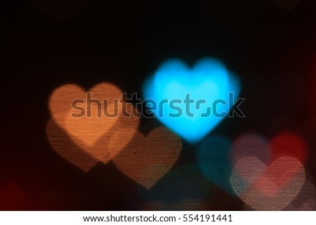 Colorful heart-shaped on black background lighting bokeh for decoration at night backdrop wallpaper blurred valentine, Love Pictures background, Lighting heart shaped soft at night abstract