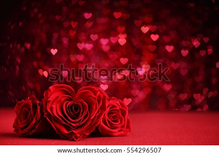 Roses Bouquet and Hearts background.Valentine or Wedding background Royalty-Free Stock Photo #554296507