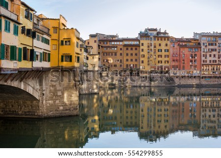 Ponte Vecchio bridge and Arno river in Florence, Italy.