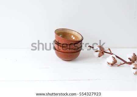 Minimal elegant composition with cotton and bowls