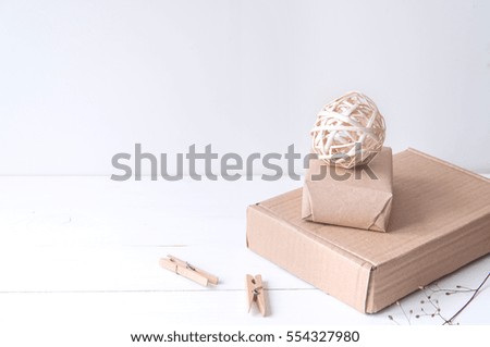 Minimal elegant composition with rattan balls and craft boxes