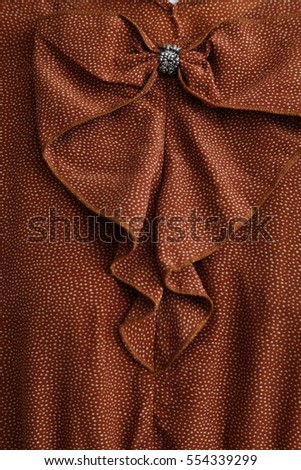 ruffle, ruffles on woman's blouse  