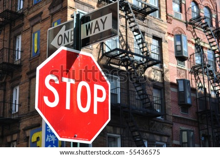 Stop sign and one way sign in New York City.