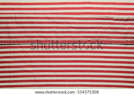 The item of clothing. The texture of fabric in white and red stripes
