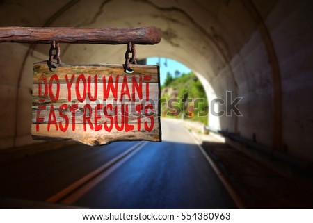 Do you want fast results motivational phrase sign on old wood with blurred background