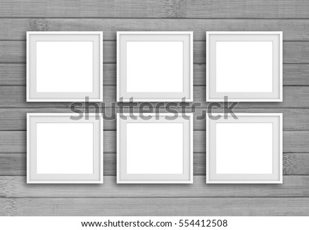 Group of white frames on grey wooden panels wall, Gallery style design mock up