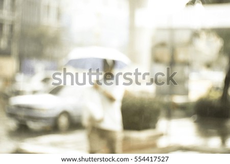 Blurred  background abstract and can be illustration to article of People walking on the rain