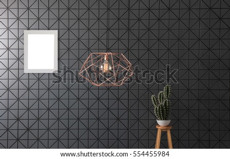 black textured wall and modern lamp and frame