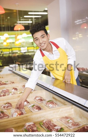 	A supermarket meat salesman	