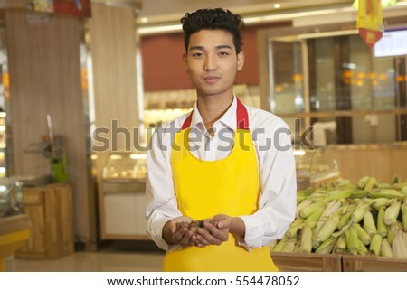 	A young shop assistant	