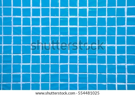 Texture of fine little ceramic tiles background. Blue floor tiles