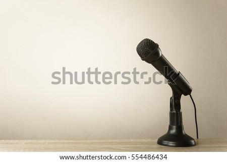 A black microphone on table.
