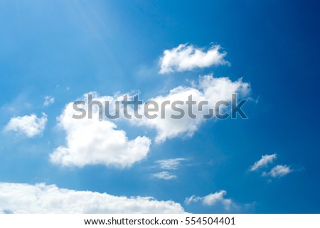 Sky clouds,sky with clouds and sun Royalty-Free Stock Photo #554504401