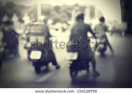 Blurred  background abstract and can be illustration to article of Bikers driving a motorcycle