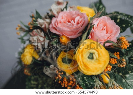 beautiful bridal bouquet of different flowers on the table