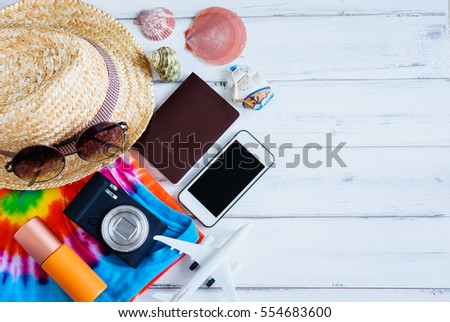 Summer holiday background, Beach accessories on white wood and copy space ,Vacation and travel items concept.