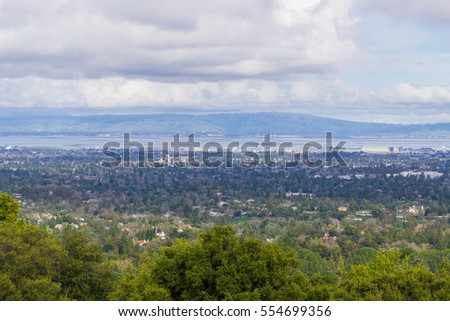 View towards Sunnyvale and Mountain View, Silicon Valley on a cloudy day, after a storm, south San Francisco bay, California