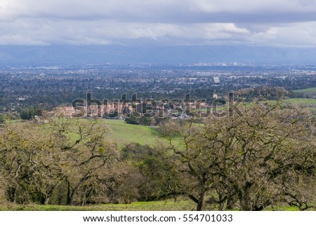 View towards San Jose and Cupertino on a cloudy day, after a storm, south San Francisco bay, California