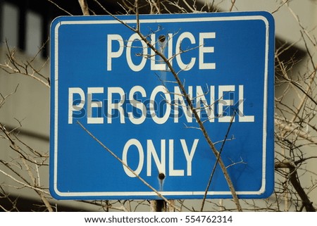 POLICE PERSONNEL ONLY SIGN