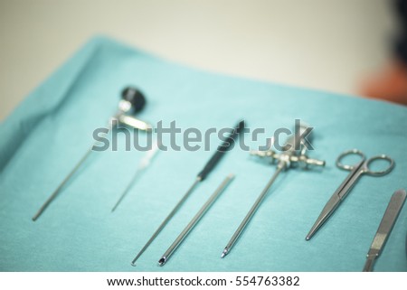 Surgery instrumentation in emergency room operating theater operation with instruments for the surgeon and knee procedure.