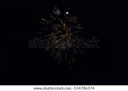 Colorful Fireworks light up the night dark sky with dazzling display, 4th of July, New Year celebration fireworks isolated, sparkles, stars and twinkles. The end of the Festival 