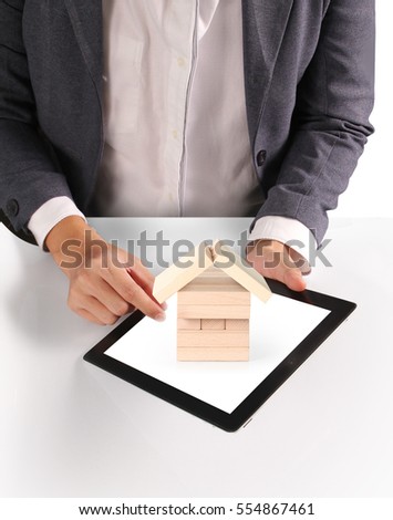 hands holding and pointing  contemporary digital tablet

