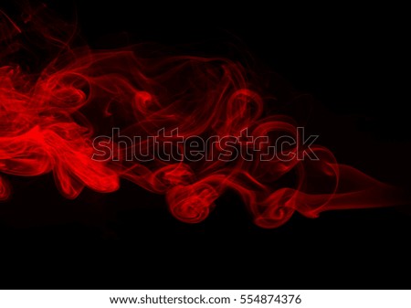 Movement of red smoke abstract on black background