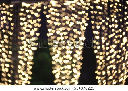 Yellow gold heart-shaped hanging valentine background Colorful lighting bokeh white for decoration night backdrop wallpaper blurred valentine, Love Pictures lighting heart shaped soft night abstract