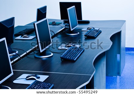 computers with LCD screens in IT office Royalty-Free Stock Photo #55495249