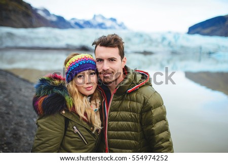 portrait of couple at lake in Iceland